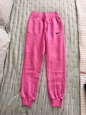 Nike women’s Pink Drawstring Joggers with Black Swoosh